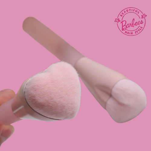 Pink heart-shaped makeup brush
