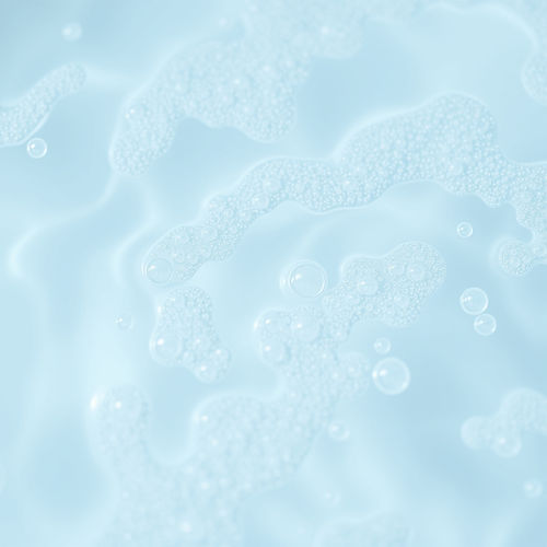 close up of bubble bath water, show rippling clear blue water and bubbles.jpg