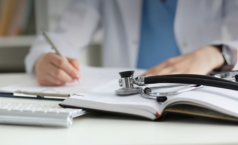 stethoscope-head-lying-medical-forms-closeup-while-medicine-doctor-working-background.jpg