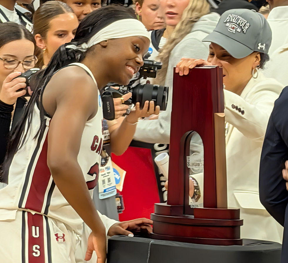 Raven Johnson, left, has a moment with her coach Dawn Staley during the awards ceremony after South Carolina advance to the Final Four by beating TCU 72-58 at Golden 1 Center on March 3, 2026 in Sacramento, California.