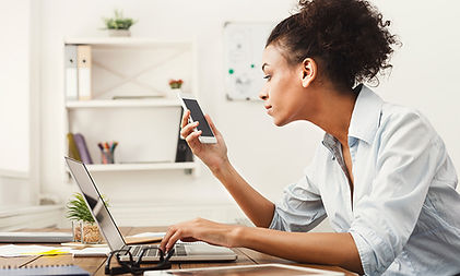 business-woman-looking-at-smartphone-PQR