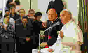 Pope Francis leads a meeting with the poor in the archbishop’s residence in Assisi, Italy, in 2013. (Credit: CNS file/Paul Haring.)