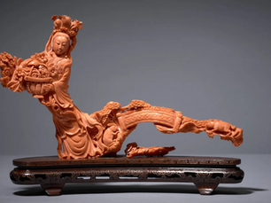 Chinese coral: A red treasure carved with legends