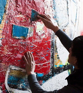 Artist Painting a Mural