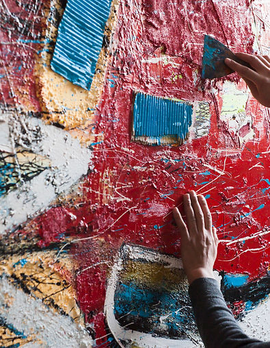 Artist Painting a Mural