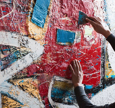 Artist Painting a Mural