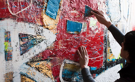 Artist Painting a Mural