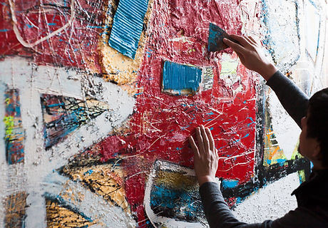 Artist Painting a Mural