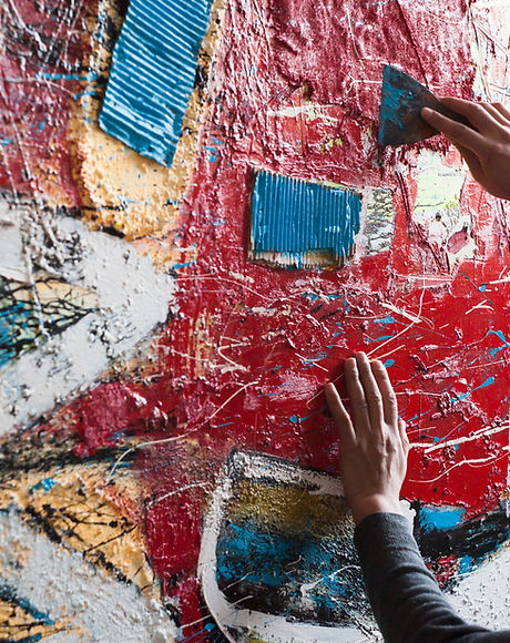 Artist Painting a Mural