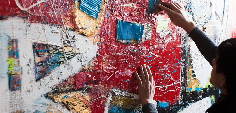 Artist Painting a Mural