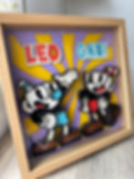 Cuadro 3D de Cuphead y Mugman en madera, pintado a mano con efecto tridimensional.