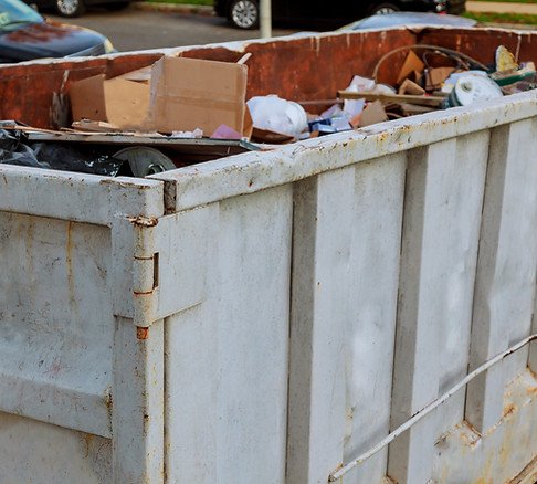 dumpsters-being-full-with-garbage-over-flowing-2025-04-02-15-26-15-utc.jpg