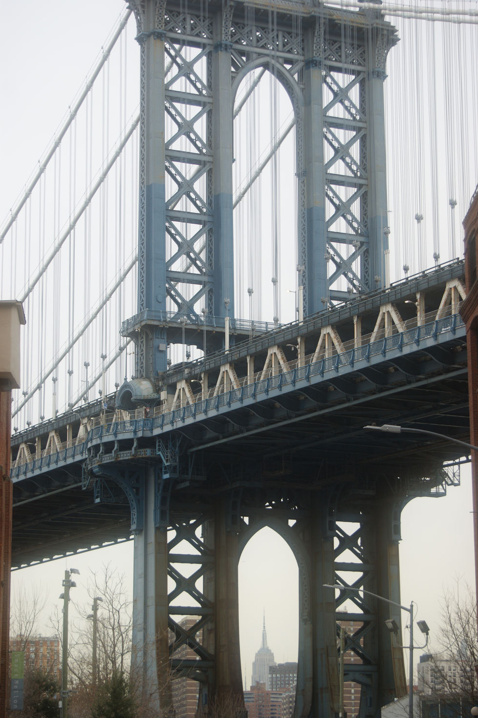 EMPIRE STATE BUILDING THROUGH MANHATTAN BRIDGE