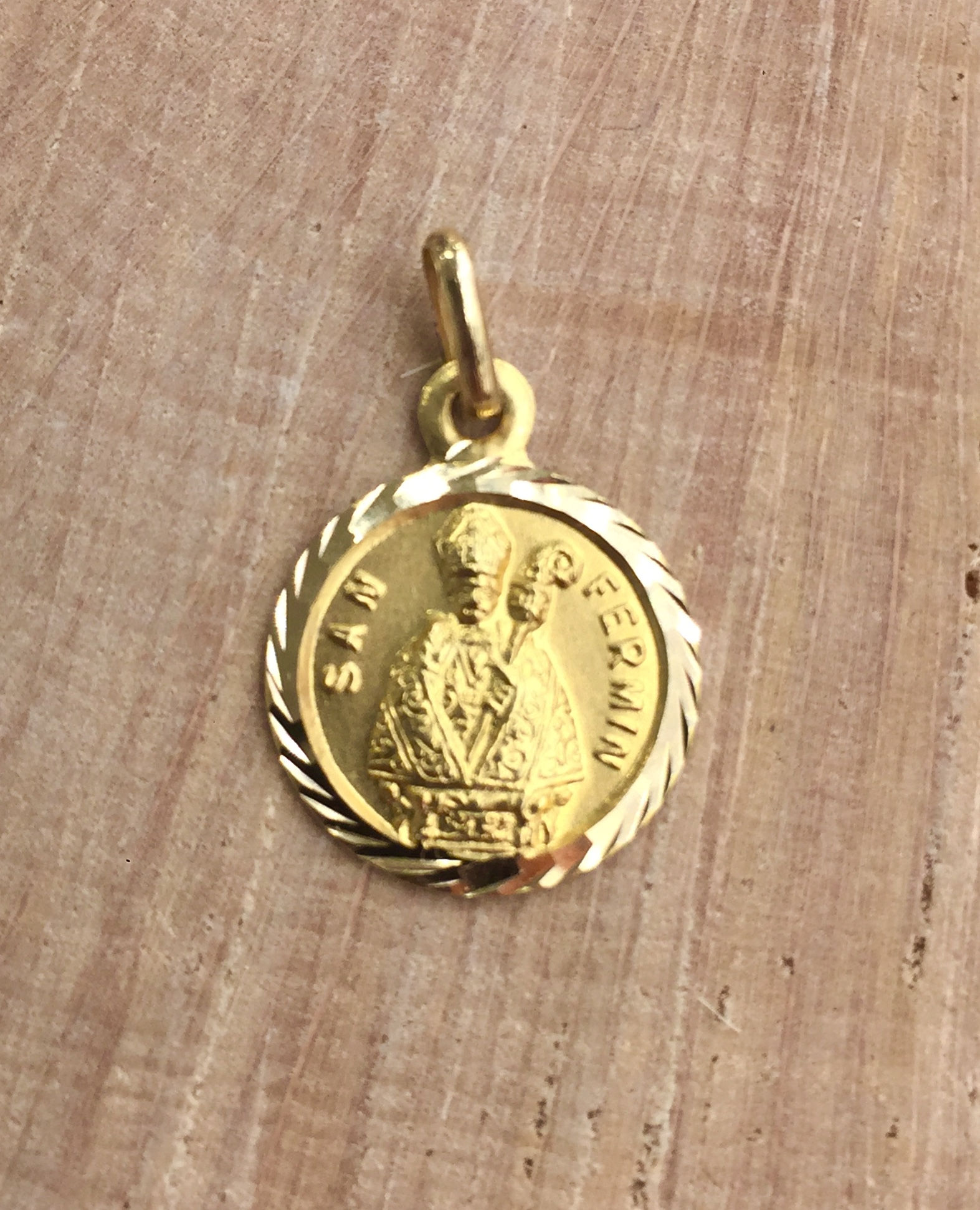 Medalla San  Fermín  pequeña  en Oro.