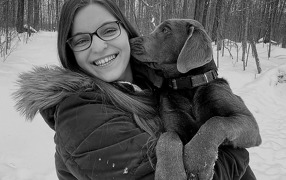 Picture of designer with her dog.