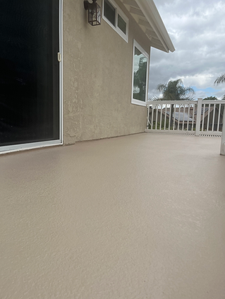 Newly waterproofed deck, enhancing home exterior