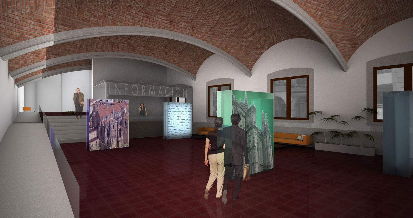 Interior de edificio histórico rehabilitado con bóvedas de ladrillo adaptado como espacio expositivo cultural.