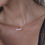 Thumbnail: Luna Bezel Moissanite Curved Bar Necklace