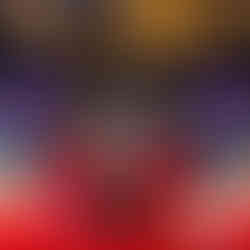 A high-end lounge and dining space at Papi Steak Las Vegas, featuring plush red and ivory seating, black marble tables, and bold floral-patterned walls framed in gold. The ceiling is adorned with dazzling golden chandeliers, casting a warm glow over the elegant setting. Deep blue and teal chairs complement the sophisticated ambiance, while large display screens showcase dynamic event visuals.