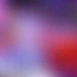 A performer in a silver futuristic outfit poses next to a glowing LED infinity dance floor at a high-energy event.