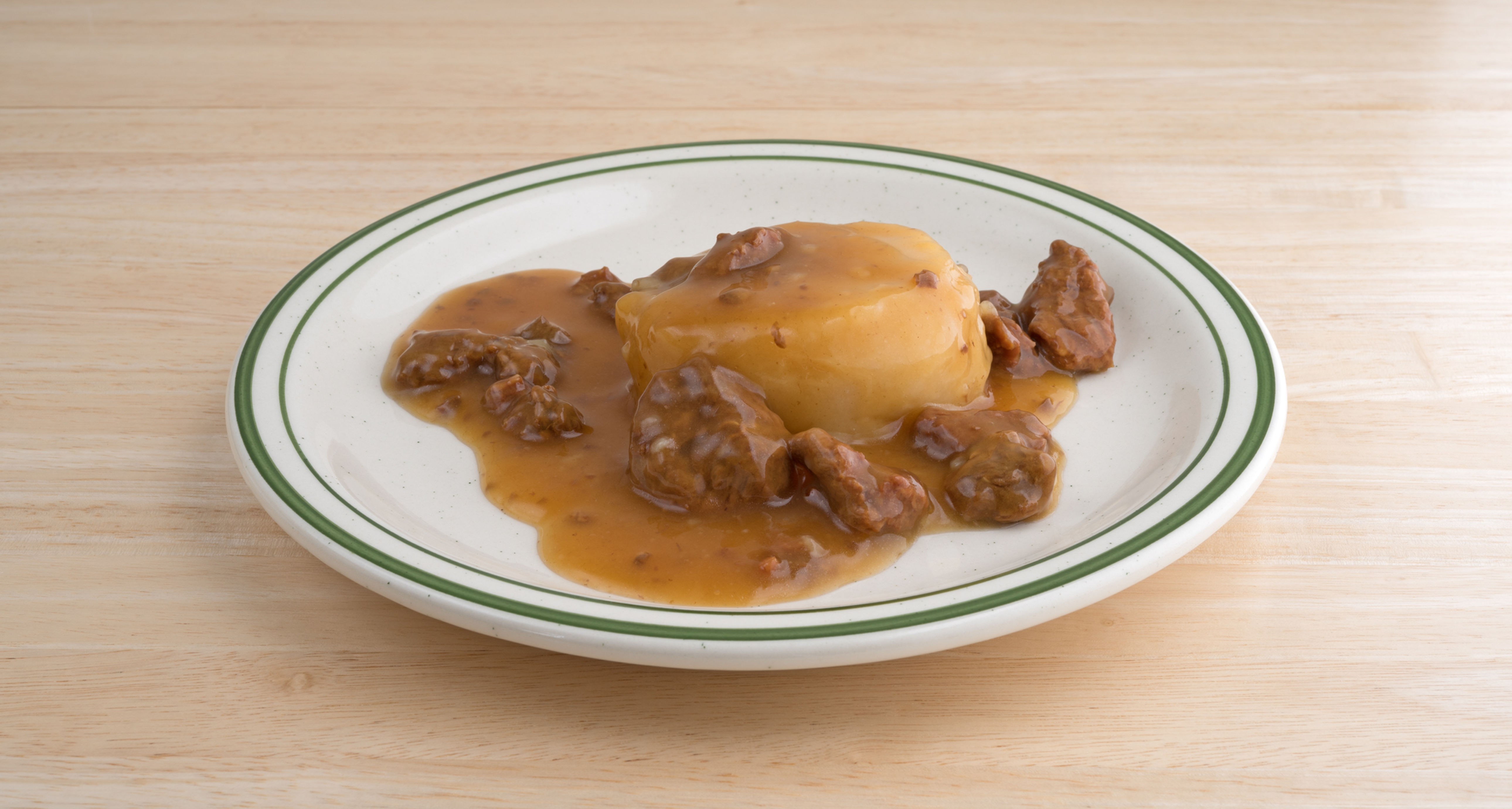 Beef Tips Over Mashed Potatoes