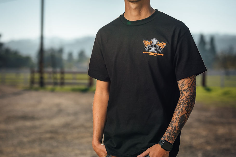 Black Zombie Wings graphic T-shirt with skeletal winged skull print across the chest