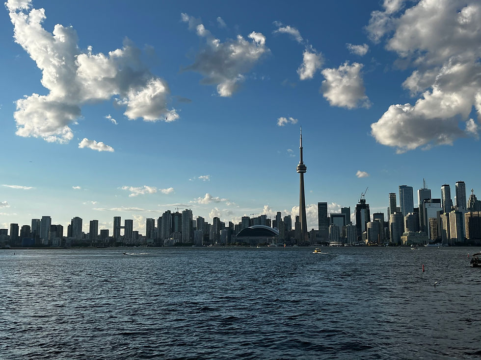Toronto skyline across the water with CN Tower view