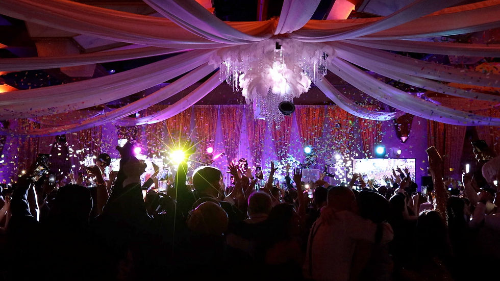 Decorated New Year's Eve party with people on the dance floor