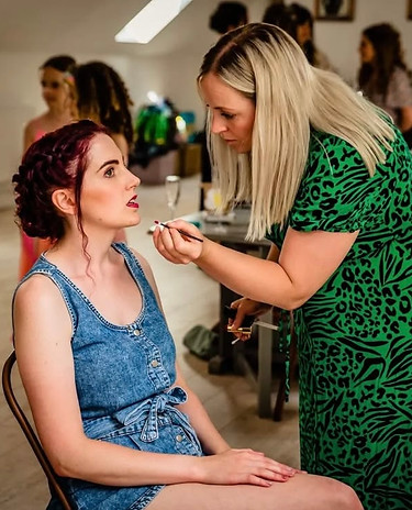 Bride Sarah having her make up done for wedding day