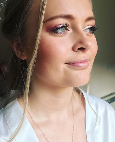 Bride lauren just before final touches on her wedding day.