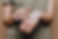 woman adds cbd hemp oil topical lotion to her hands