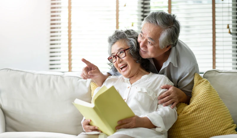 Couple connecting through cognitive stimulation therapy through Connect at Home with  Dementia Connected