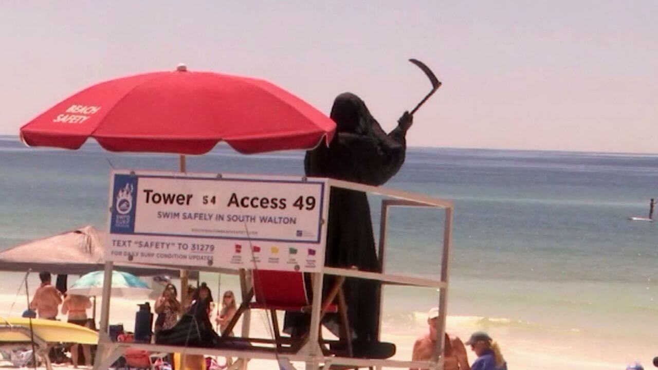 Grim Reaper tours Florida Beaches as they Re-Open
