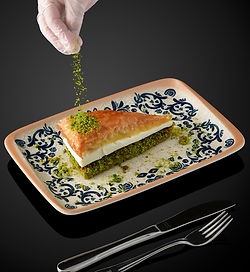 1 Slice
Served with one layer of plain ice cream, pistachio powder.