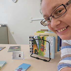 The author pleased to organize another table display with her books