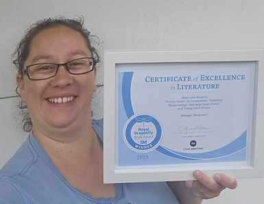 Author showing off one of her latest awards