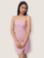 a model wearing a fashionable ribbon tie strapped dress