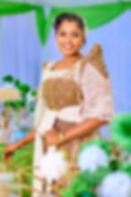 Bride in traditional Gomesi by a wedding photographer in Uganda