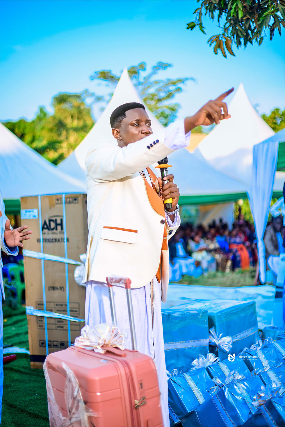 Groom at a traditional wedding by a photographer in Uganda