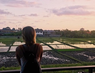 The digital nomad life with sunset views from Bali co-working space, C’ugh House. Photo by: Tiff Ng