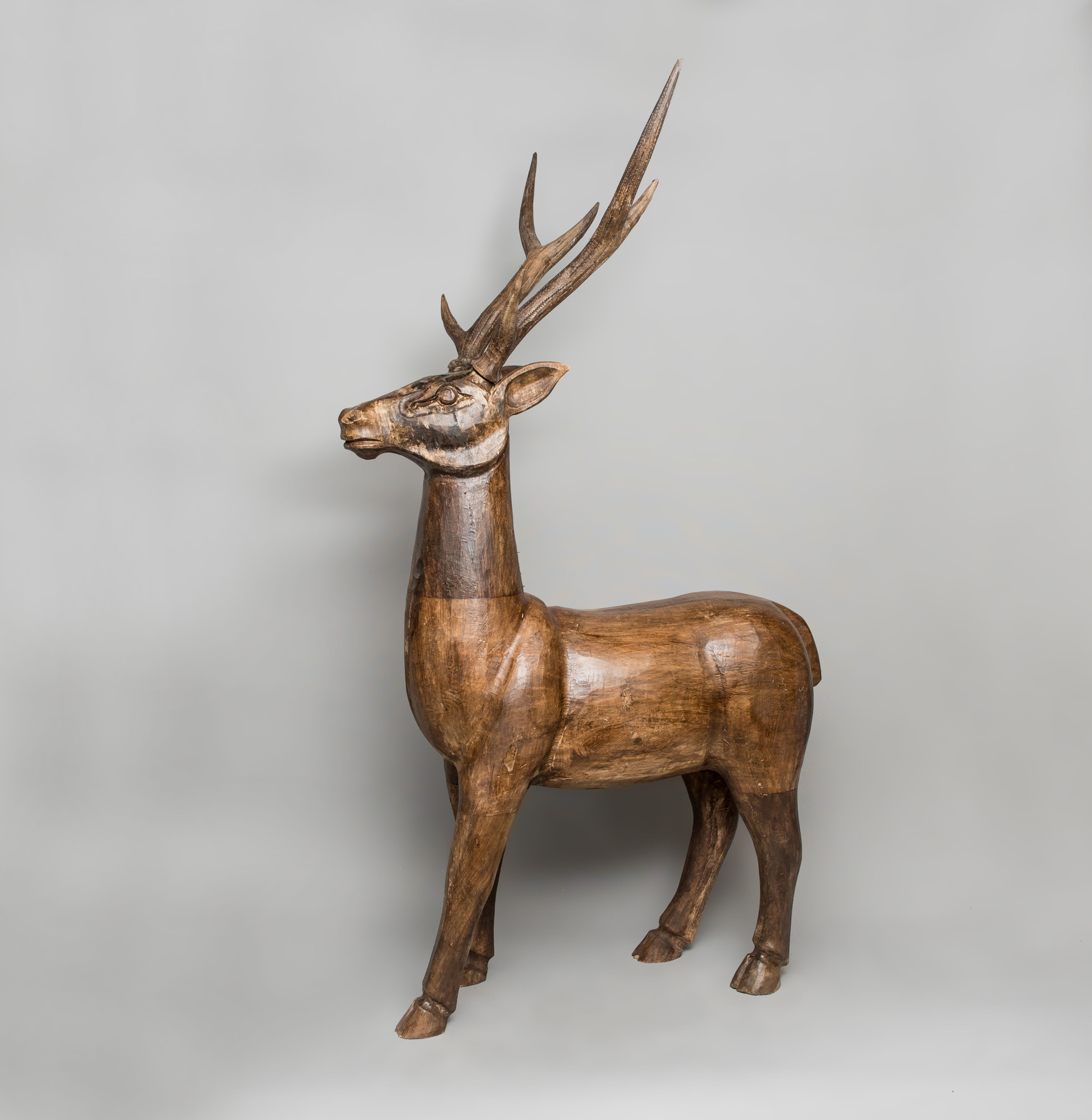 Hand Carved Wooden Reindeer Medium