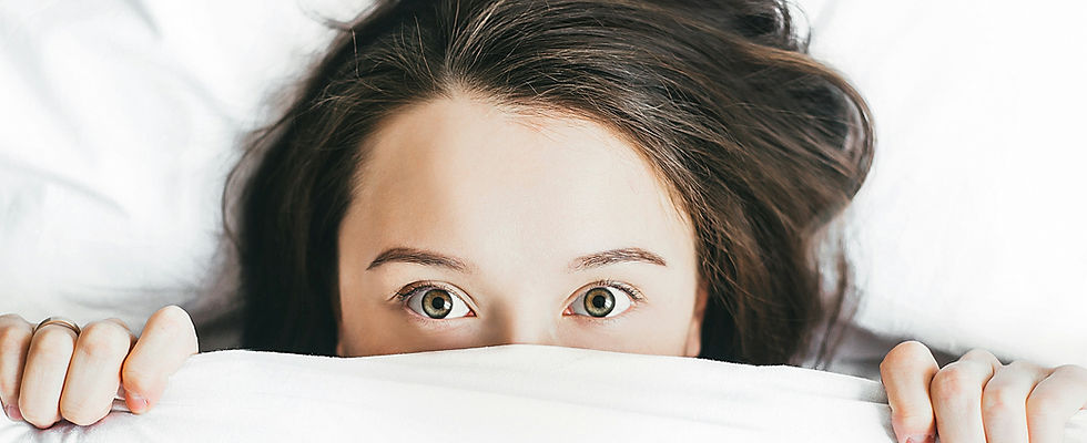 Girl above the covers.jpeg