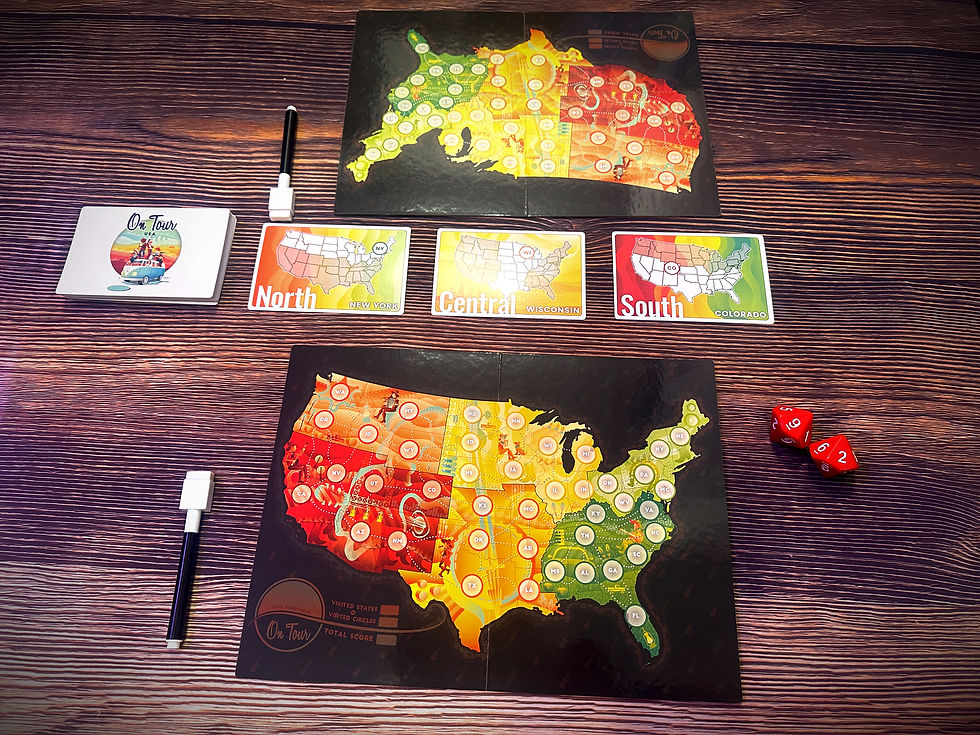 Board game with US map, colorful regions, and cards labeled North, Central, South. Dice and markers on a wood-textured surface.