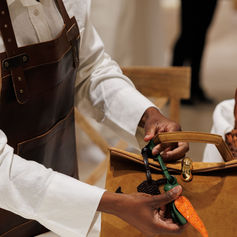 Close-up of refreshments being prepared and served at the Jacquemus opening event.