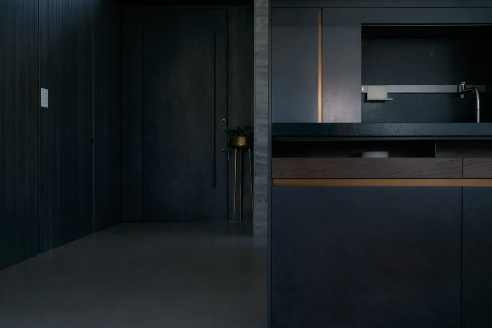 Luxury kitchen island in modern Dubai villa with integrated lighting, premium materials, and open-plan layout.