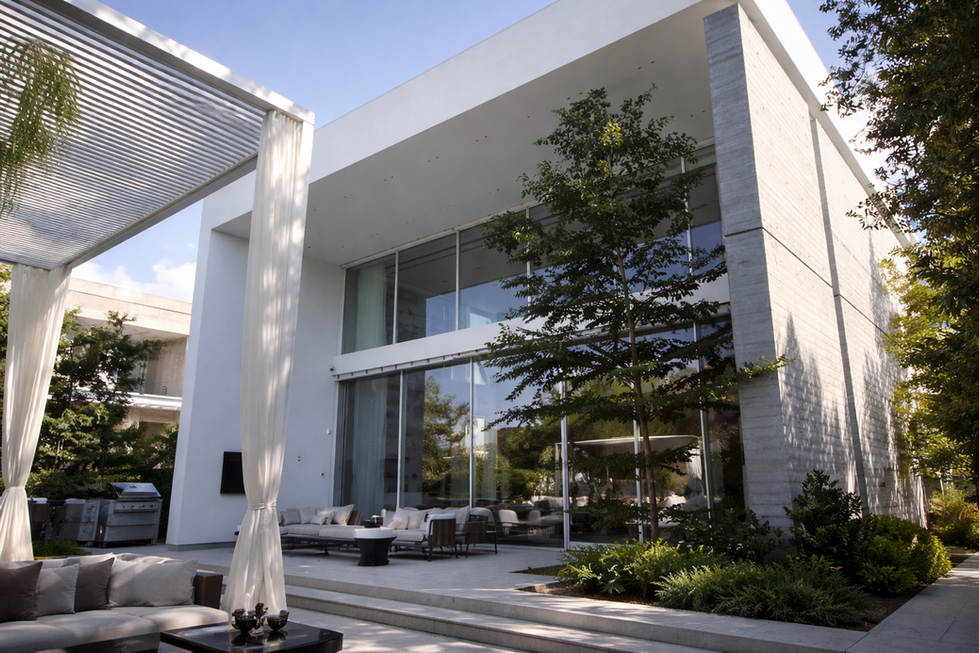 Double height luxury living room in Dubai villa with panoramic glass walls and modern architecture.