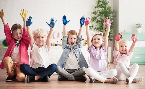group-children-with-colorful-painted-hands.webp