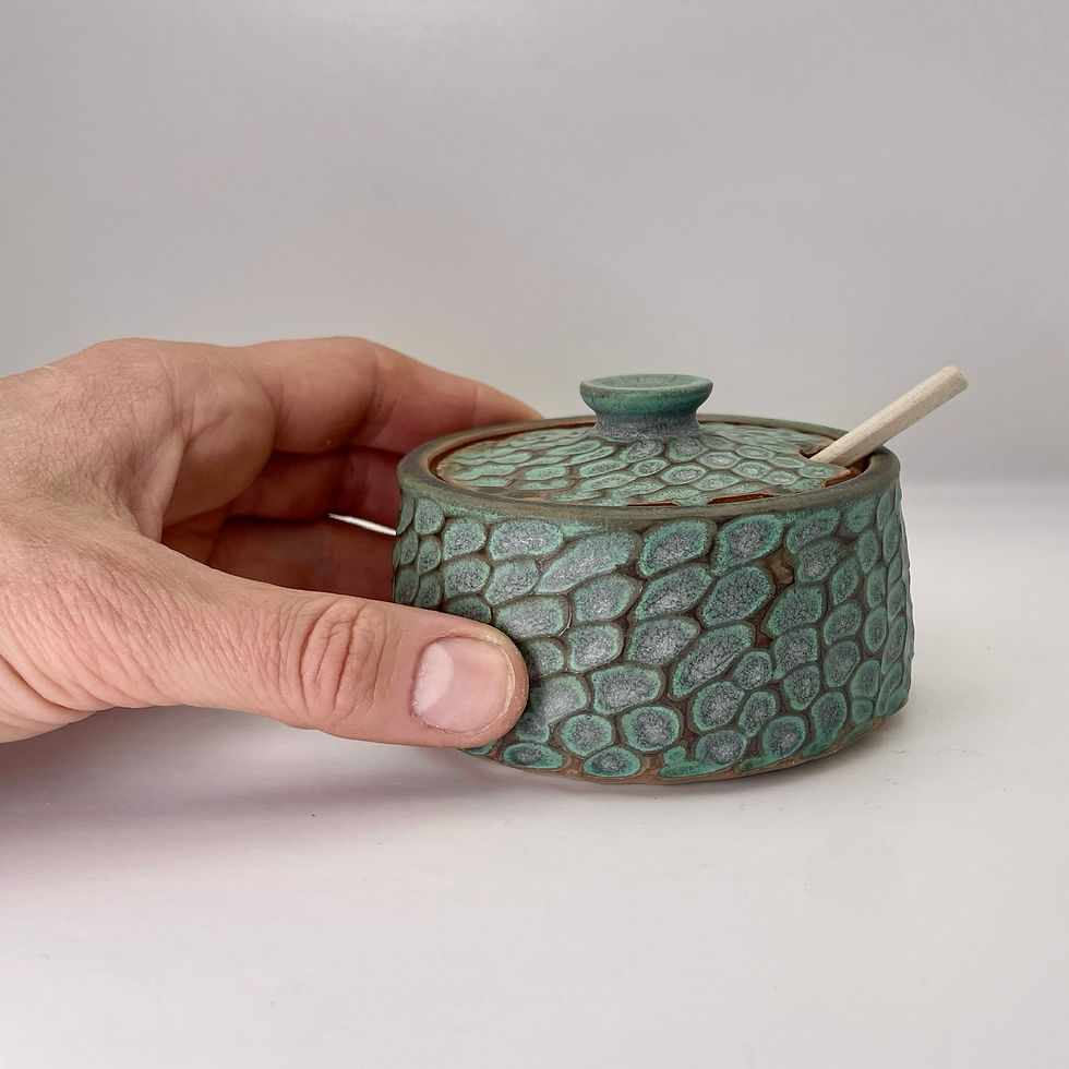 Thumbnail: Carved salt pot in weathered green