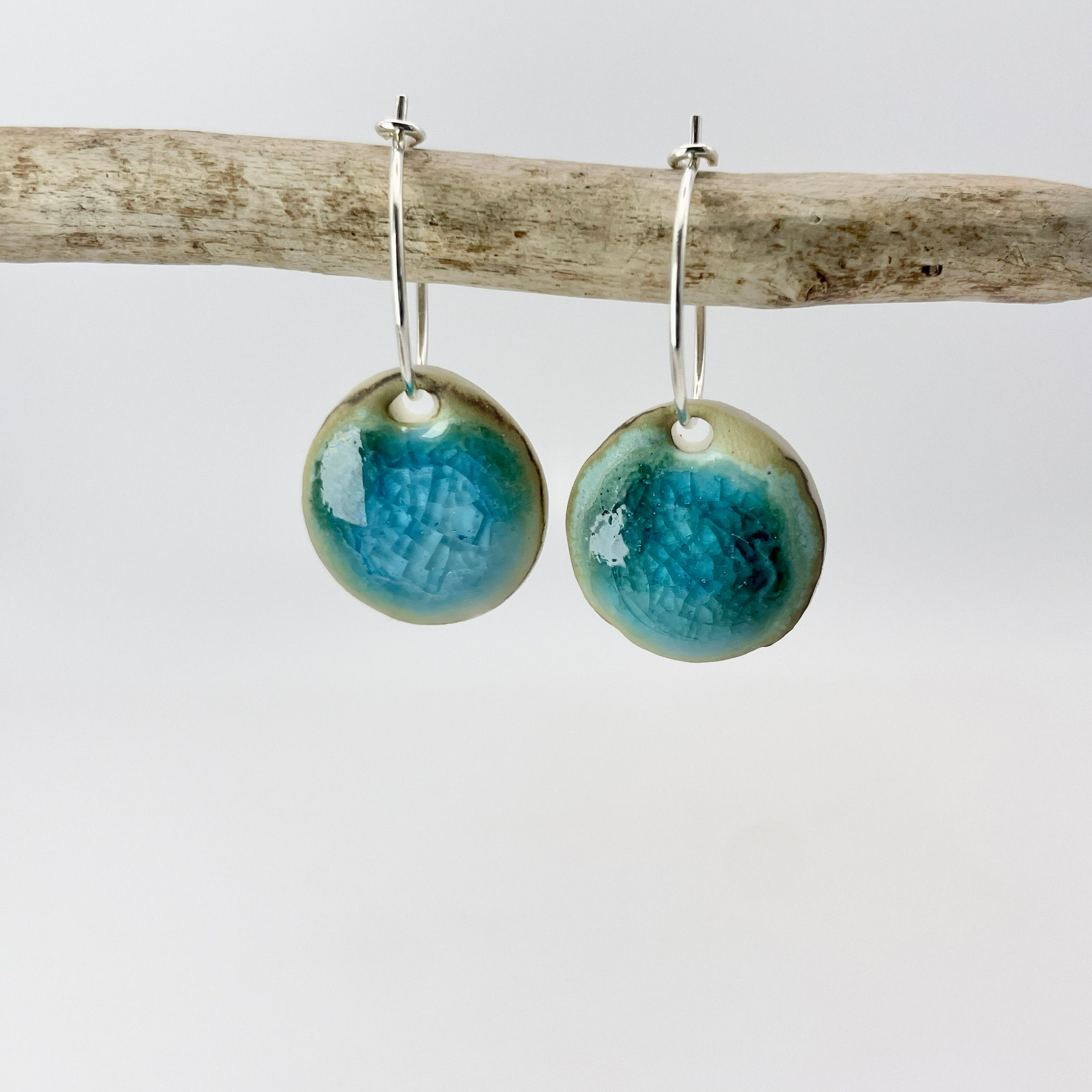 Small circular porcelain earrings in turquoise