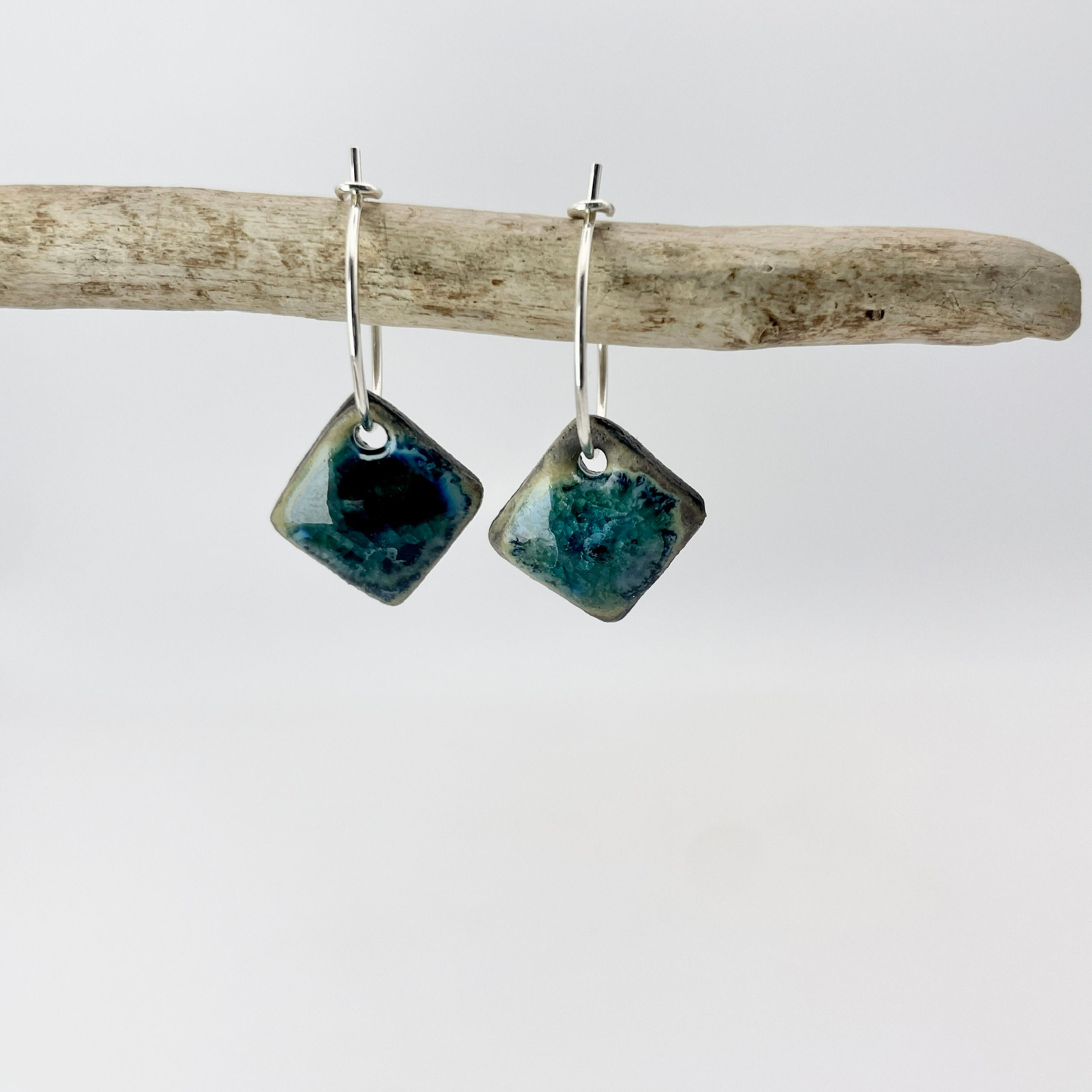 Mini square black porcelain earrings in deep green-blue